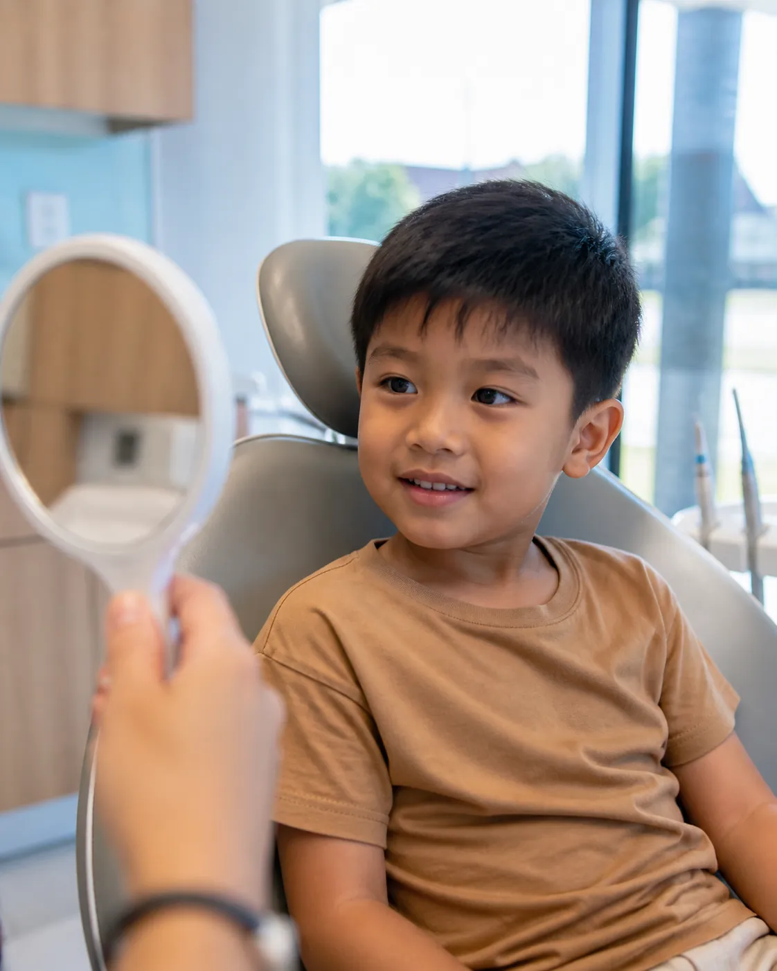 A parent and child laughing together in our reception